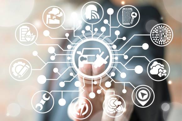 Finger zeigt auf Diagramm mit Industriesymbolen 