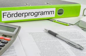 Aktenordner mit Aufdruck Förderprogramm 