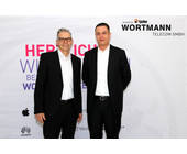 Dirk Wölk (Mitglied der Geschäftsleitung Epsilon Telecom, li.) und Stefan Bollmann, Geschäftsführer Wortmann Telecom