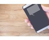 Smartphone mit Sprechblase