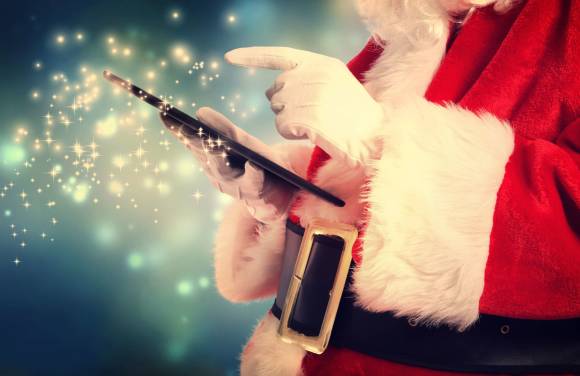 Weihnachtsmann mit Tablet 